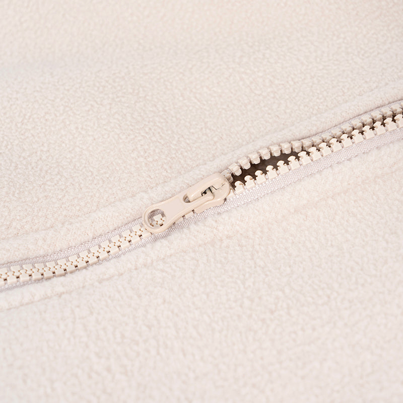 Close-up of the fleece vest front zipper